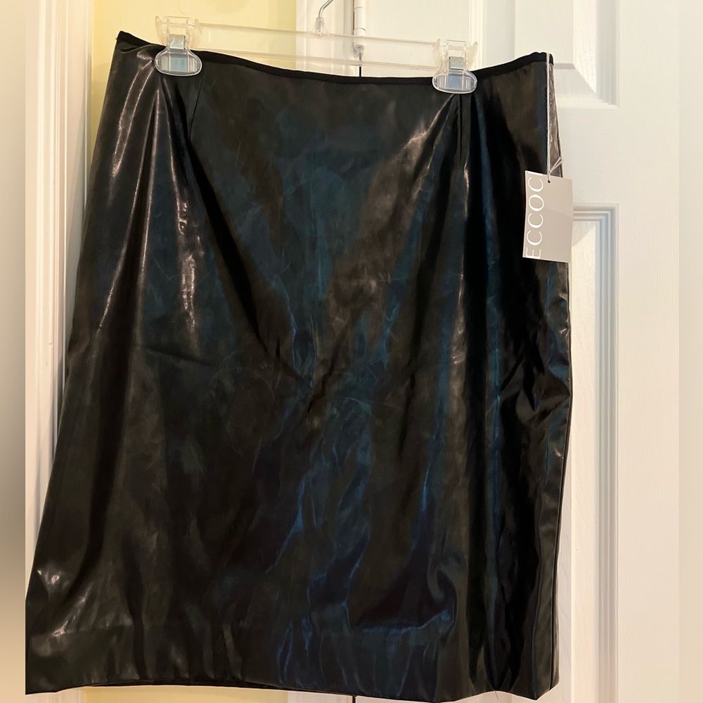 Black leather skirt, size 12, perfect for a casual or formal event.